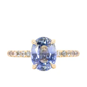 2.44ct Oval Madagascar Sapphire with French Set Montana Sapphires and Salt & Pepper Diamond Solitaire in 14k Yellow Gold