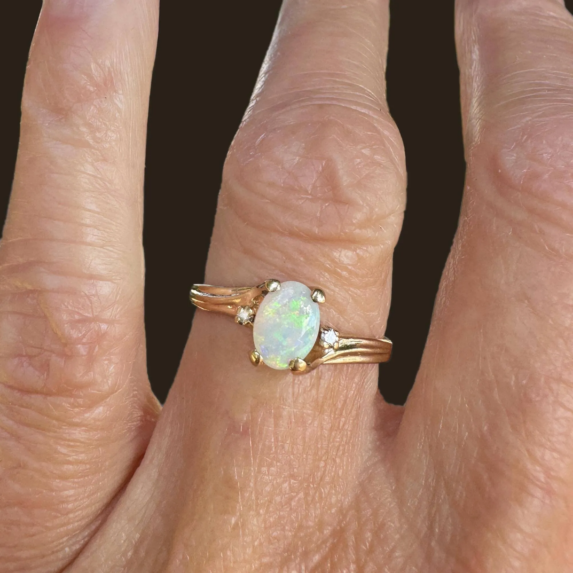 Charming Diamond Accent Opal Solitaire Ring in Gold