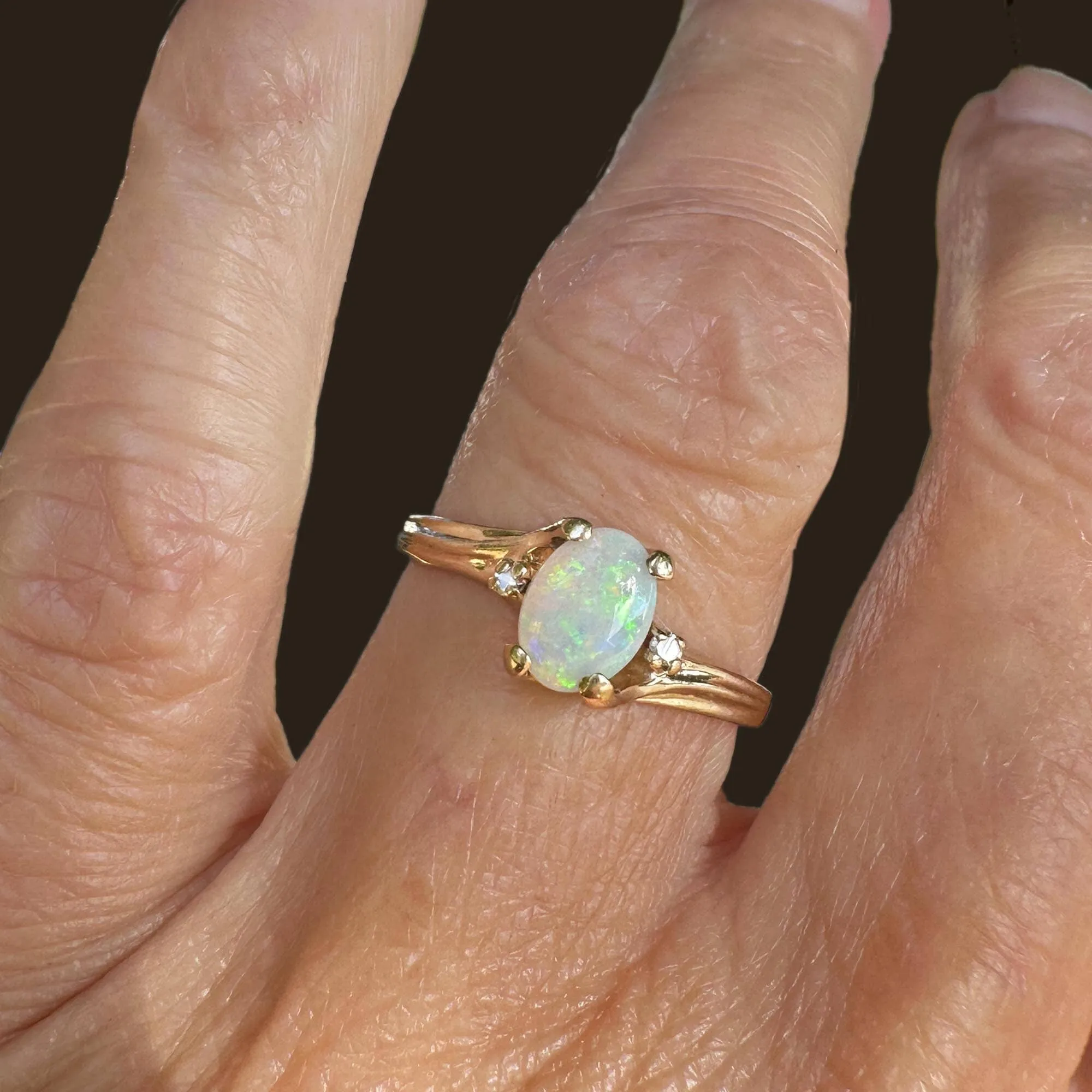 Charming Diamond Accent Opal Solitaire Ring in Gold