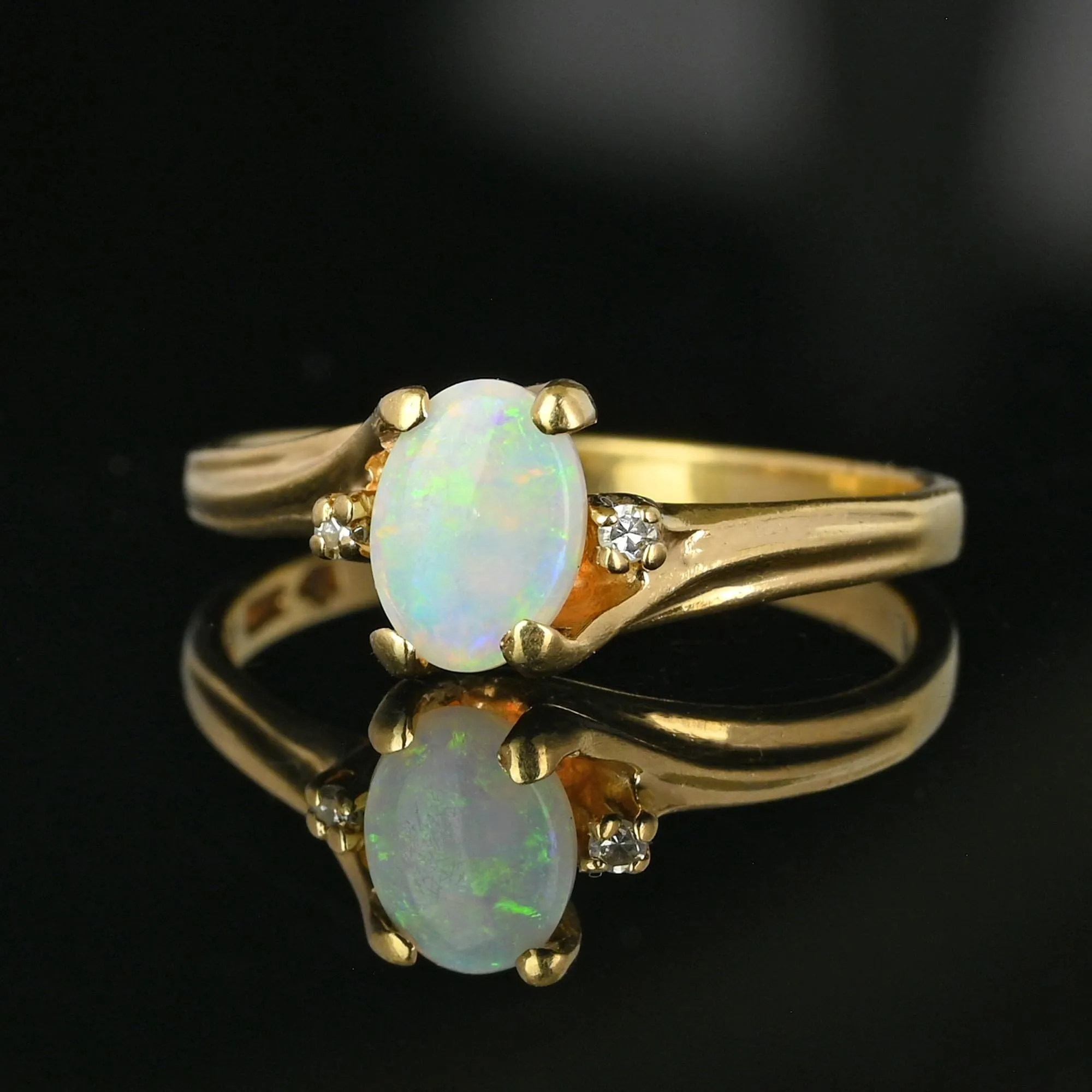 Charming Diamond Accent Opal Solitaire Ring in Gold