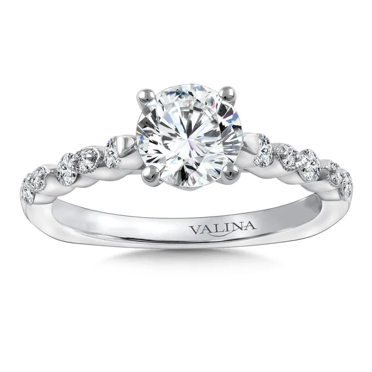 Diamond stackable engagement ring mounting with milgrain detailing and side stones set in 14k white gold.