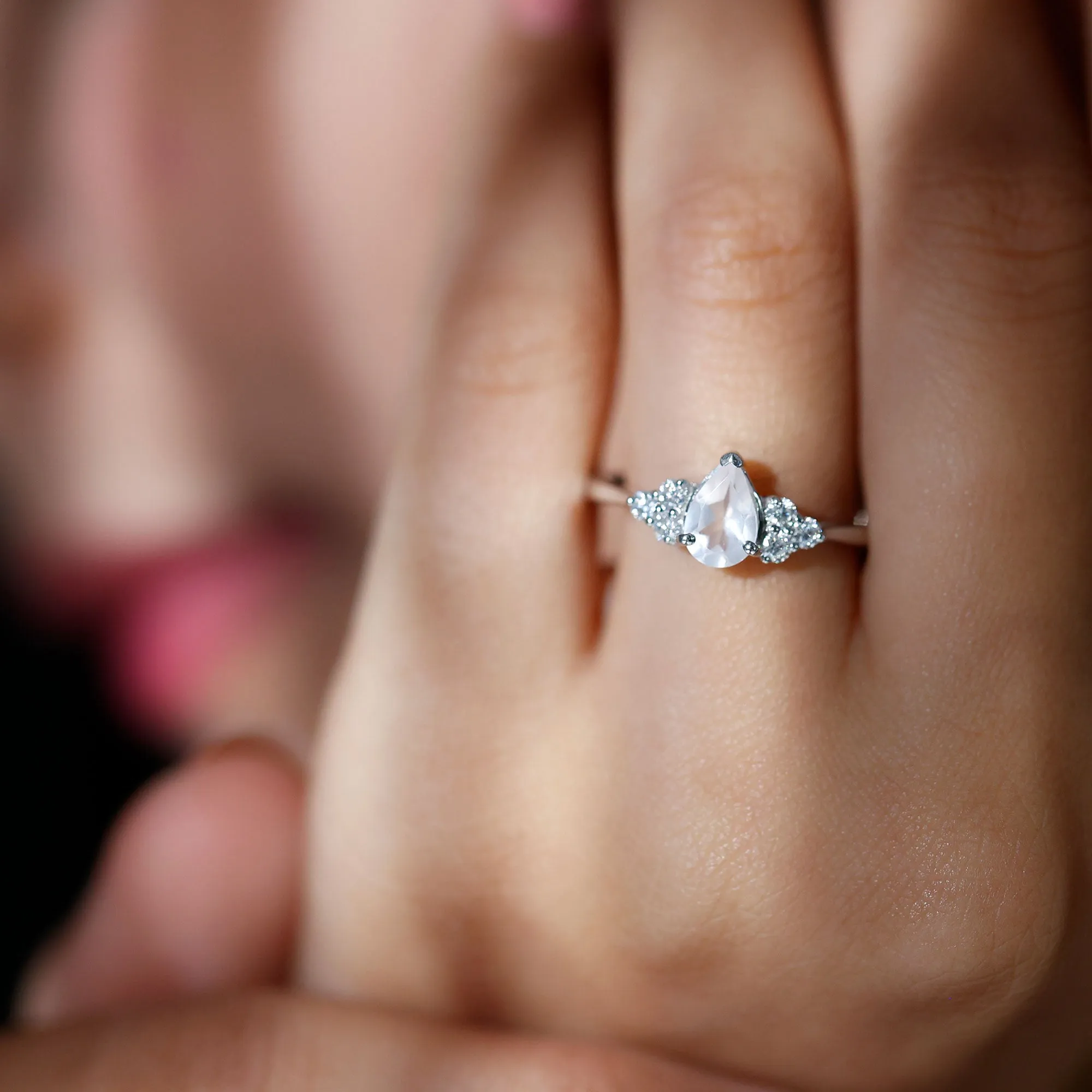 Pear Shaped Rose Quartz Solitaire Engagement Ring with Diamond Trio