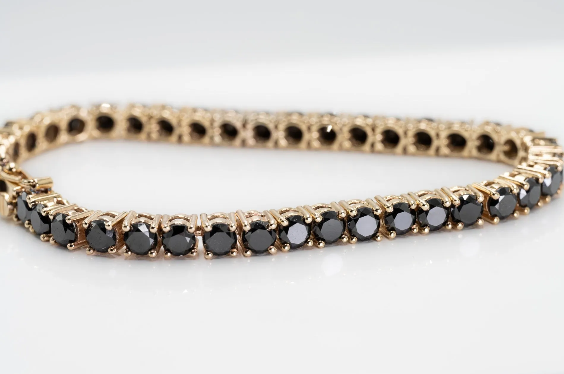 "Valentine's Sparkle: 10K Gold Black Diamond Tennis Bracelet"