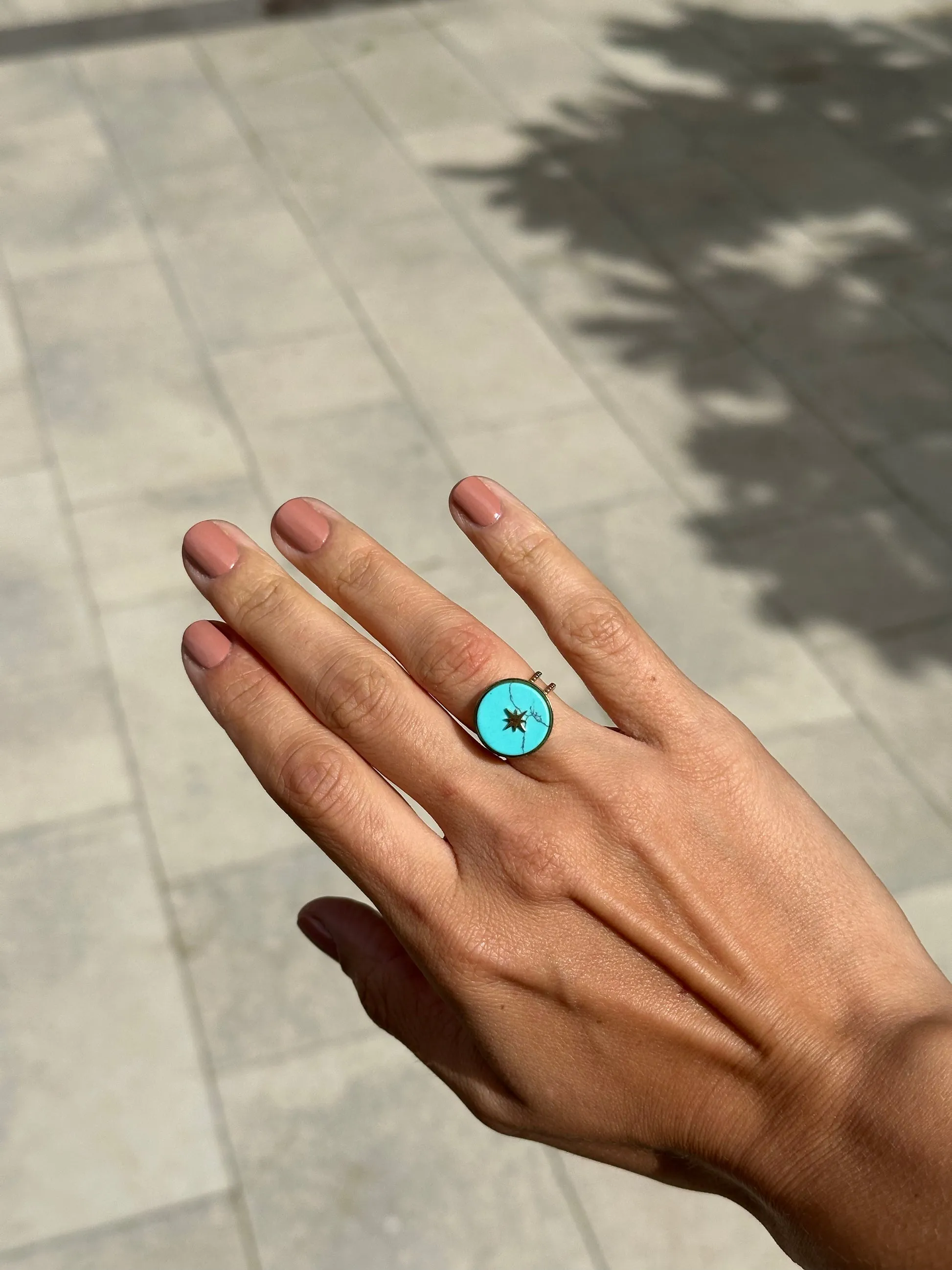 Round ring with blue stone