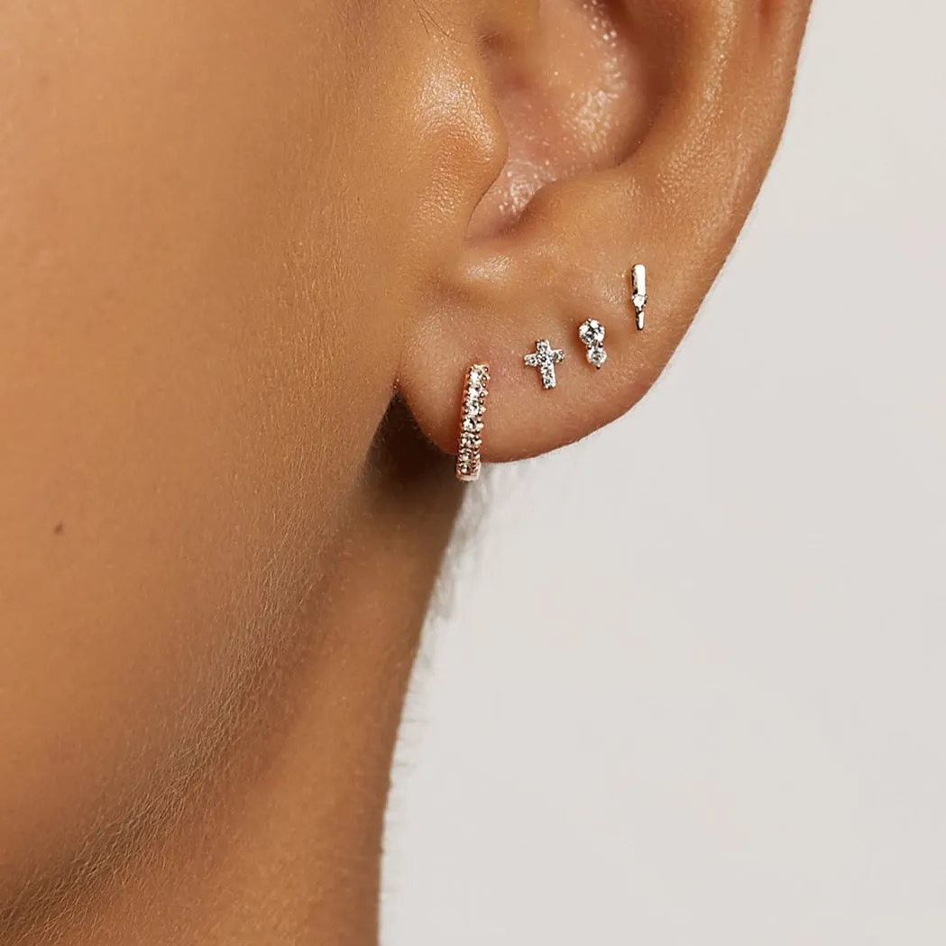 White Topaz Rainbow Huggie Earrings in Rose Gold