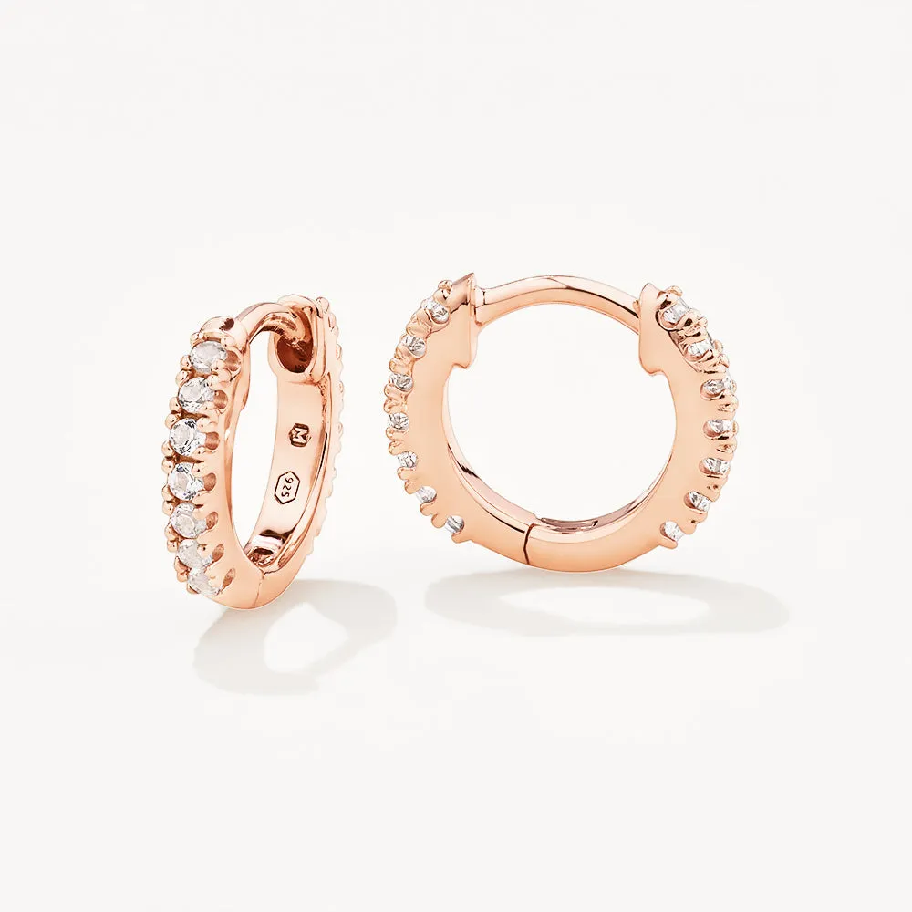 White Topaz Rainbow Huggie Earrings in Rose Gold